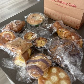 85°C Bakery Cafe-Aurora - Chocolate croissant, egg tart, ube bread, coconut everything. I forgot the other's names. - Bakeries Near Me - Aurora, Colorado