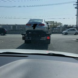 15 minutes later and my car was on his truck...wwwwhaaaattt?!?! Talk about speedy service!! 15 minutes later and my car was on his truck...wwwwhaaaattt?!?! Talk about speedy service!!