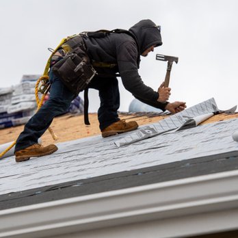 Holladay Grace Roofing - a man working on a roof - Roofing Near Me - Colorado Springs, Colorado Holladay Grace Roofing - a man working on a roof - Roofing Near Me - Colorado Springs, Colorado