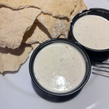Darryl's Wood Fired Grill - Pizza crust chips/crackers - New American Near Me - Greensboro, North Carolina Darryl's Wood Fired Grill - Pizza crust chips/crackers - New American Near Me - Greensboro, North Carolina