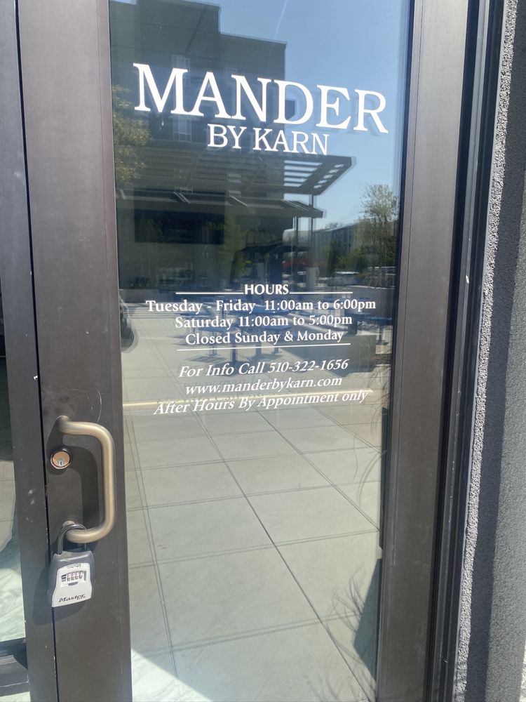 Mander By Karn Logo