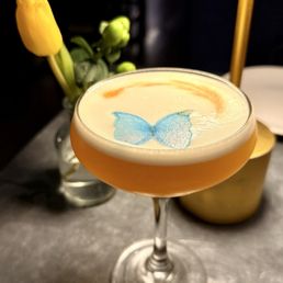 The Kennedy (vodka, passion fruit liqueur, pineapple, lime, egg white) The Kennedy (vodka, passion fruit liqueur, pineapple, lime, egg white)
