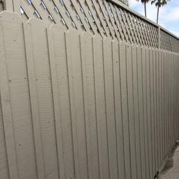 Lattice added to fence, painted and wood added to cover holes.