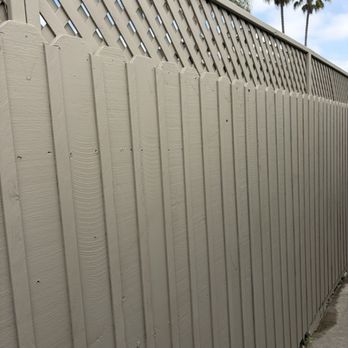 Handyman Daddy - Lattice added to fence, painted and wood added to cover holes. - Painters Near Me