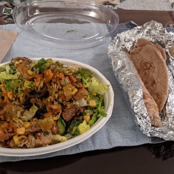 Sam and Curry - Chicken tikka rice bowl with naan and roti on the side - Indian Near Me - San Jose, California Sam and Curry - Chicken tikka rice bowl with naan and roti on the side - Indian Near Me - San Jose, California