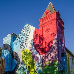 Exterior outside entrance of Culture House DC - Culture House Building Exterior with mural by renowned artist HENSE - Washington, DC, District of Columbia Exterior outside entrance of Culture House DC - Culture House Building Exterior with mural by renowned artist HENSE - Washington, DC, District of Columbia