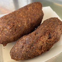 two sausages on a plate two sausages on a plate