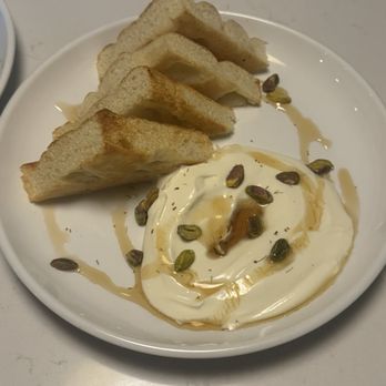 Otto And Blue - Whipped ricotta with pistachio and honey with fresh focaccia - Wine Bars Near Me - High Point, North Carolina Otto And Blue - Whipped ricotta with pistachio and honey with fresh focaccia - Wine Bars Near Me - High Point, North Carolina