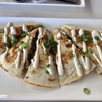 SoLou - Boudin quesadillas with spicy horseradish drizzle - New American Near Me - Baton Rouge, Louisiana SoLou - Boudin quesadillas with spicy horseradish drizzle - New American Near Me - Baton Rouge, Louisiana