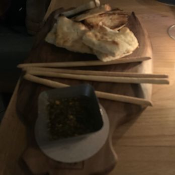 La Strega - Bread board with dipping oil - Italian Near Me - Las Vegas, Nevada La Strega - Bread board with dipping oil - Italian Near Me - Las Vegas, Nevada