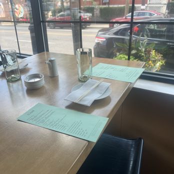 Kiki On Ludlow - Window seating at the front of the house offers a great view of Ludlow Ave. - Asian Fusion Near Me - Cincinnati, Ohio