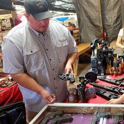 Dakota Ammo - Brian Carter showing my confused Wife the gun.  She is under numerous medications for her severe concussion. I told him to STOP!.
