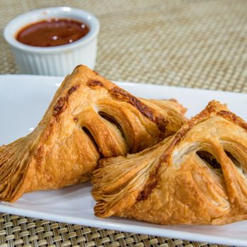 Satya Asha - three pastries on a plate with dipping sauce - Indian Near Me - Surrey, British Columbia