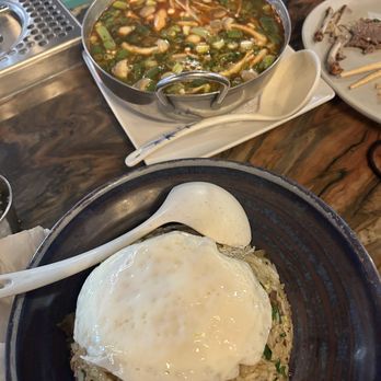Le Thai - Tom Yum with shrimp in the back and Short Rib Fried Rice in the front with a perfectly cooked Fried Egg - Thai Near Me - Las Vegas, Nevada