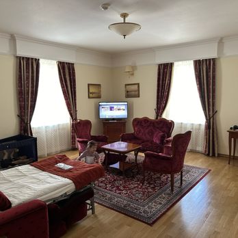 Boutique Hotel Seven Days - Living room with extra bed. They even provided baby crib - Hotels Near Me - Praha 2, Puerto Rico