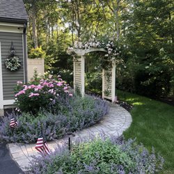 Gardens By Barbara Conolly - An award winning landscape design starts with a beautiful rose arbor