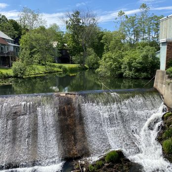 Putney General Store - a waterfall in a residential area - Delis Near Me - Putney, Vermont