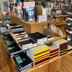 New River Art & Fiber - All the sketchbooks - affectionately known as the "sketchbook island."