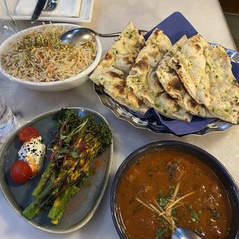 Flora Indica Chelsea - Broccoli, lamb shoulder curry, naan, rice - Bars Near Me - London, XGL Flora Indica Chelsea - Broccoli, lamb shoulder curry, naan, rice - Bars Near Me - London, XGL