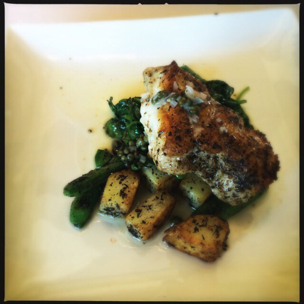 Nico's - Grilled Sea Bass with a caper buerre blanc and grilled seasonal vegetables. - New American Near Me - Long Beach, California Nico's - Grilled Sea Bass with a caper buerre blanc and grilled seasonal vegetables. - New American Near Me - Long Beach, California
