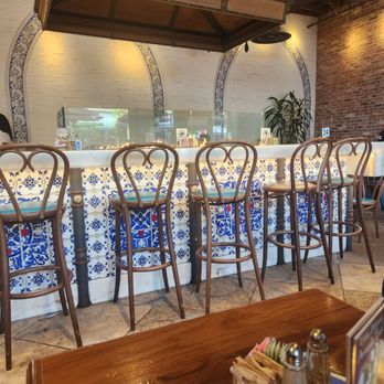 Urth Caffé - Orange - Indoors eating area with cute fireplace - Coffee & Tea Near Me - Orange, California Urth Caffé - Orange - Indoors eating area with cute fireplace - Coffee & Tea Near Me - Orange, California