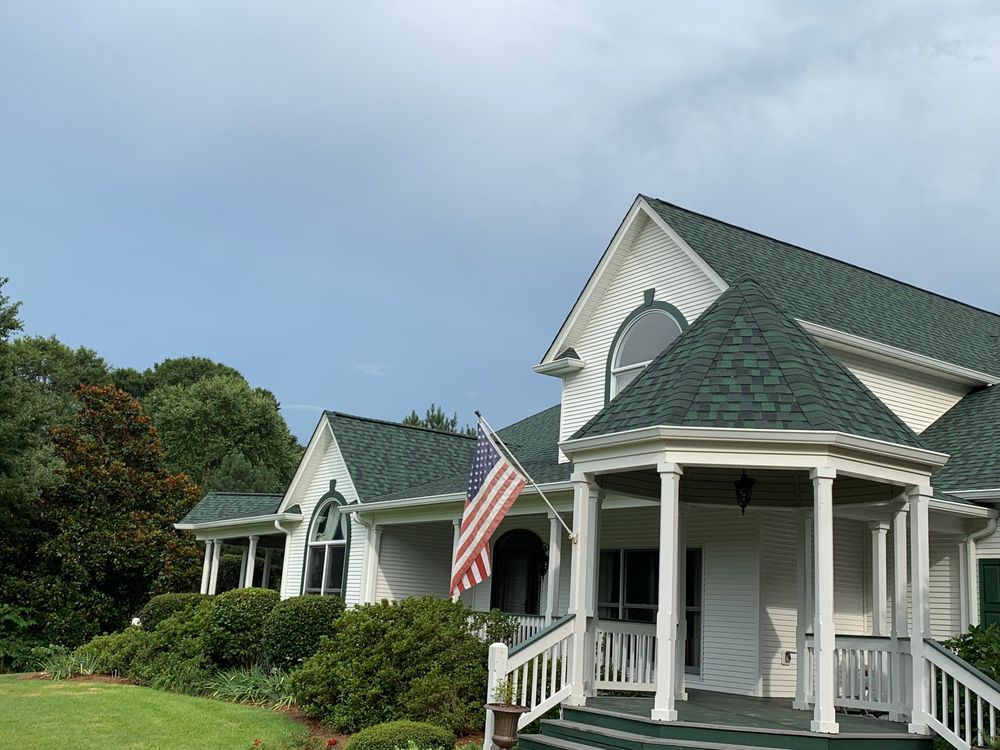 Slide of K and R Roofing