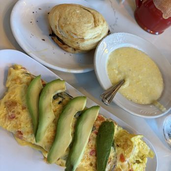 Mimosas - Southern grilled chicken, spinach and avocado omelette with side of grits and buttered croissant. - Breakfast & Brunch Near Me - Myrtle Beach, South Carolina Mimosas - Southern grilled chicken, spinach and avocado omelette with side of grits and buttered croissant. - Breakfast & Brunch Near Me - Myrtle Beach, South Carolina