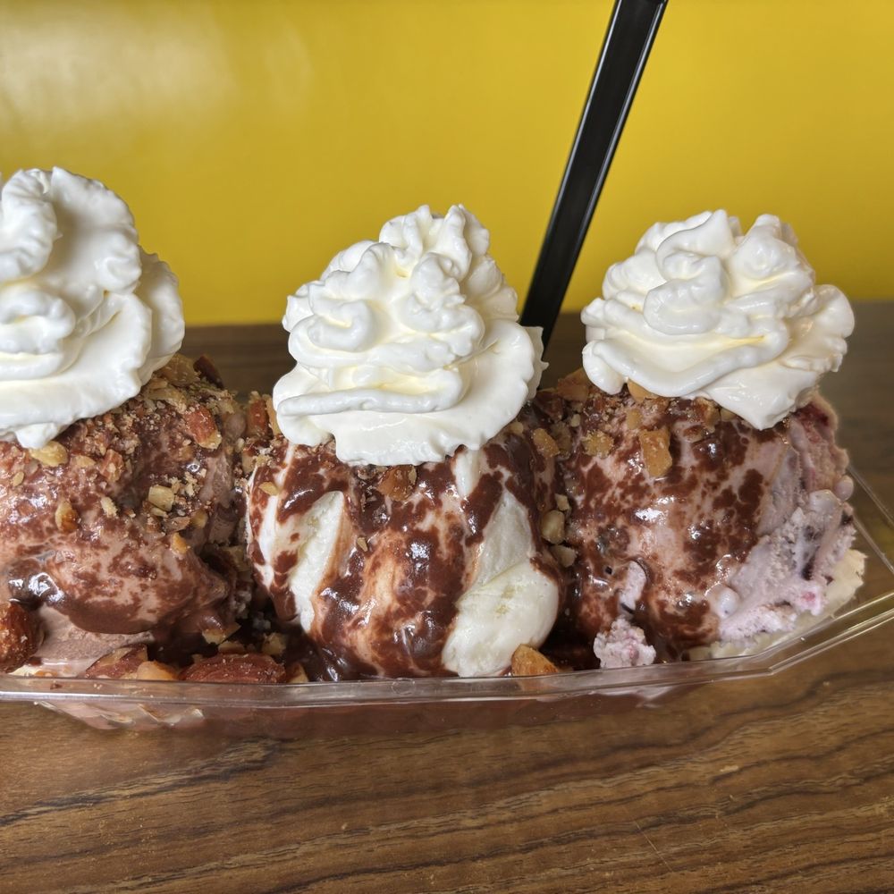 Lumpy's Ice Cream - Banana split (pick your flavor and toppings) this is chocolate, vanilla and cherry with hot fudge, nuts and whipped cream! - Ice Cream & Frozen Yogurt Near Me - Wake Forest, North Carolina Lumpy's Ice Cream - Banana split (pick your flavor and toppings) this is chocolate, vanilla and cherry with hot fudge, nuts and whipped cream! - Ice Cream & Frozen Yogurt Near Me - Wake Forest, North Carolina