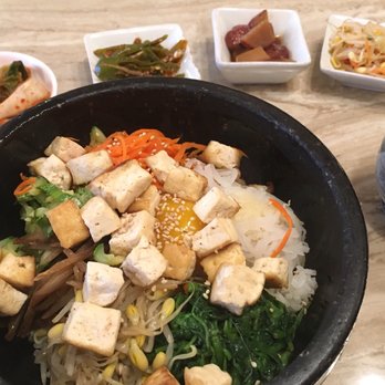 Nak Won Garden - Traditional Korean Bibimbap with tofu served in a hot bowl with kimchi, potato, pickled bean-sprouts, & peppers with sardines--delicious! - Korean Near Me - Pittsburgh, Pennsylvania Nak Won Garden - Traditional Korean Bibimbap with tofu served in a hot bowl with kimchi, potato, pickled bean-sprouts, & peppers with sardines--delicious! - Korean Near Me - Pittsburgh, Pennsylvania