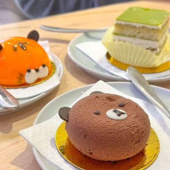 Fantastic Baby Cafe - three different cakes on plates - Desserts Near Me - Toronto, Ontario Fantastic Baby Cafe - three different cakes on plates - Desserts Near Me - Toronto, Ontario