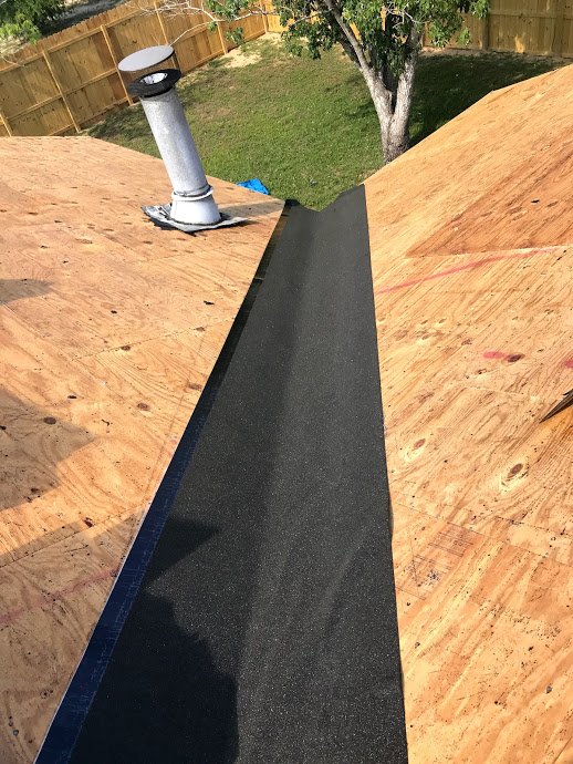Slide of Tauros Roofing Services