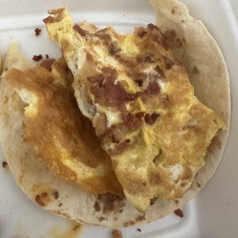 Tacos la Banqueta - Bacon and egg.. I assume they just throw the egg on the griddle and fold it - Mexican Near Me - Dallas, Texas