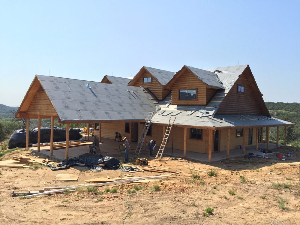 Slide of DNA Roofing & Construction