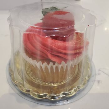 The Cupcake Arcade - Very very strawberry icing, gold shimmer and a large fresh strawberry - Cupcakes Near Me - Culver City, California The Cupcake Arcade - Very very strawberry icing, gold shimmer and a large fresh strawberry - Cupcakes Near Me - Culver City, California