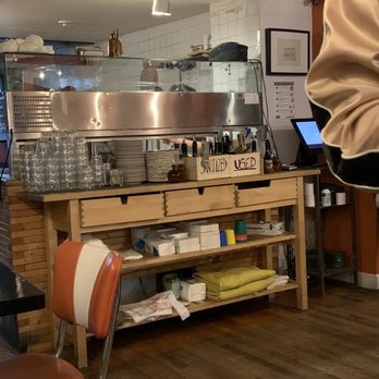 Sottocasa Pizzeria - a man standing in the kitchen - Pizza Near Me - Brooklyn, New York