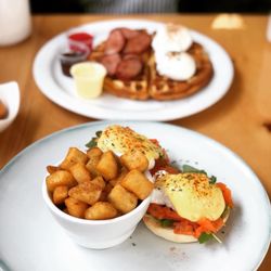 Bruncheria - Waffles with poached eggs and half a Farmer's sausage
