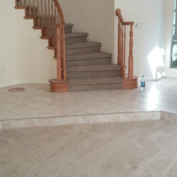 Ron's Floor Covering - a staircase leading to a second floor - Flooring Near Me