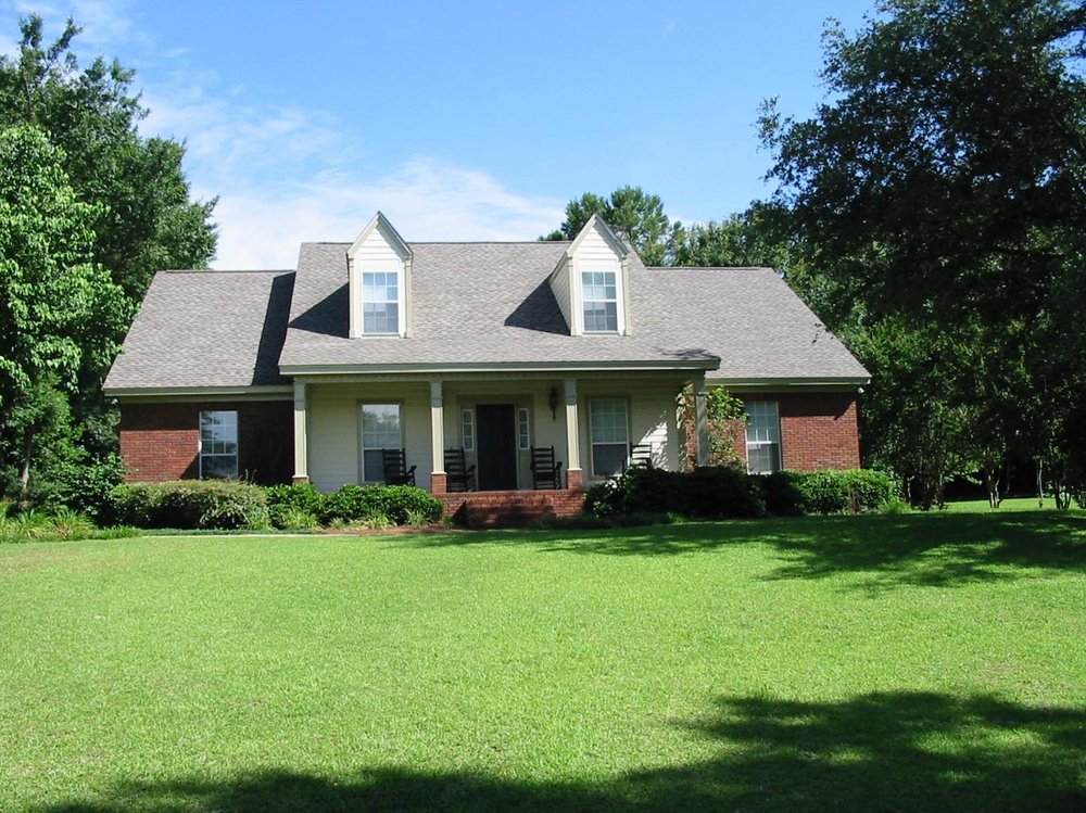 Slide of Total Quality Roofing