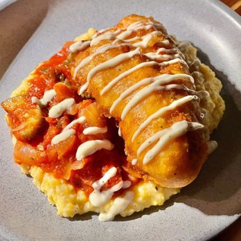 The Bistro - Catfish over smoked gouda grits. - New American Near Me - Irmo, South Carolina