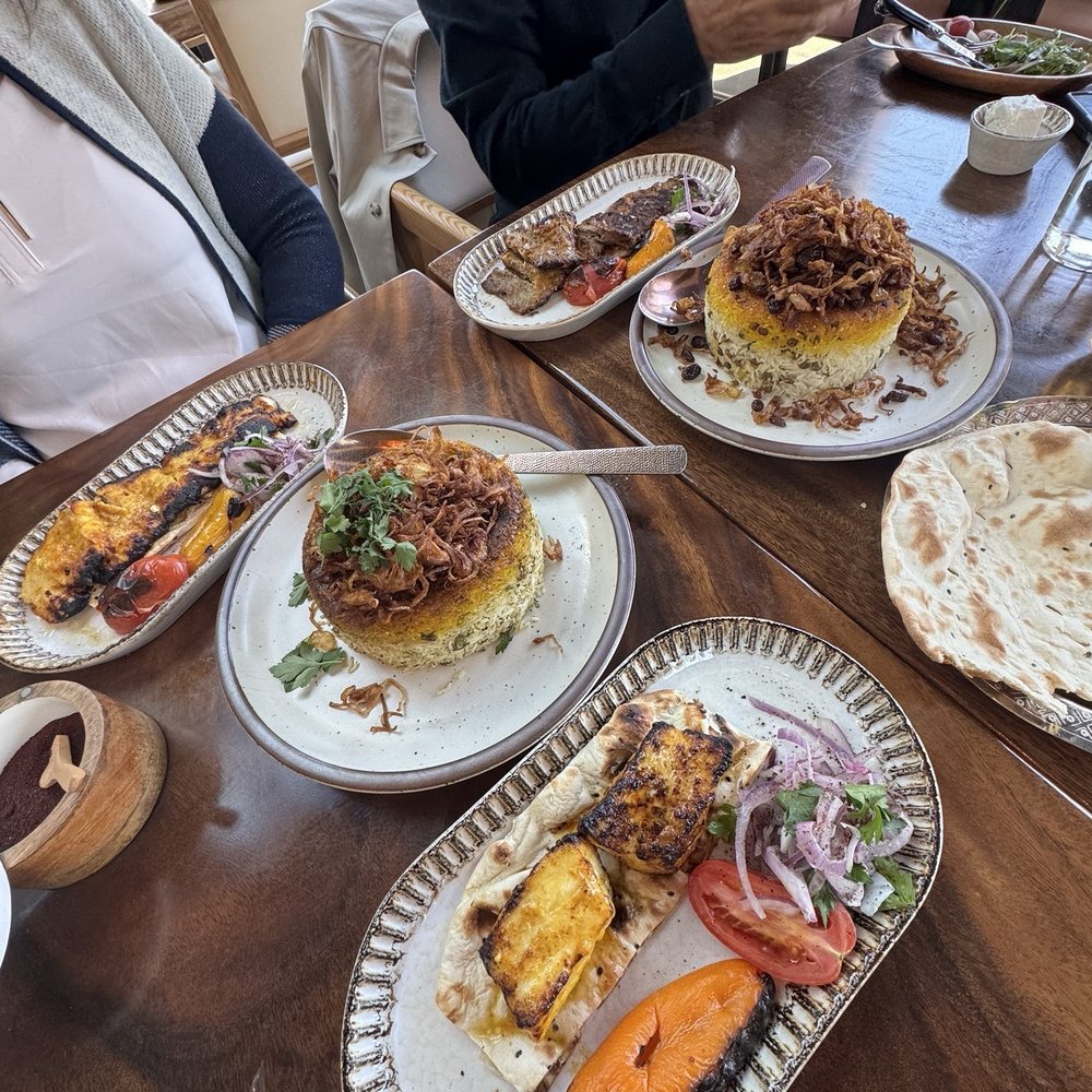 Seabass (lower). Chicken Barg (top left). Barg (top right). Sabzi Polo (center left). Adas Polo (center right). Seabass (lower). Chicken Barg (top left). Barg (top right). Sabzi Polo (center left). Adas Polo (center right).