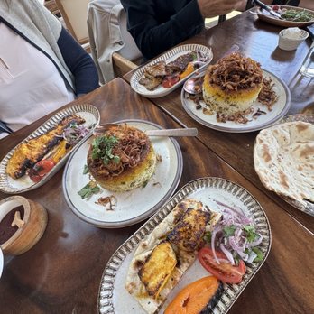 Delbar - Atlanta - Seabass (lower). Chicken Barg (top left). Barg (top right).  Sabzi Polo (center left). Adas Polo (center right). - Middle Eastern Near Me - Atlanta, Georgia
