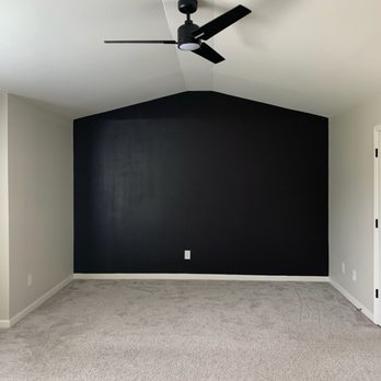 She Paints & Upgrades - Accent wall in master bedroom before being painted over - Painters Near Me