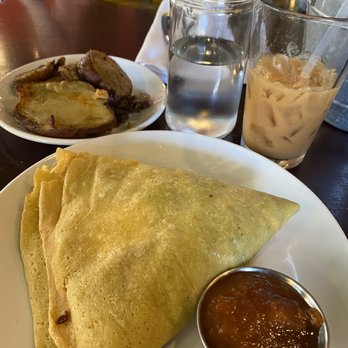 Rooster - Downtown - Goat Cheese Crepe No. 2 with bacon inside and side of potatoes with chai - Creperies Near Me - St. Louis, Missouri Rooster - Downtown - Goat Cheese Crepe No. 2 with bacon inside and side of potatoes with chai - Creperies Near Me - St. Louis, Missouri