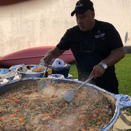 The chef cooking up some yummy Polynesian Fried Rice!
