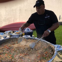 The chef cooking up some yummy Polynesian Fried Rice!
