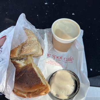The Spot Cafe - Sesame Bagel with Butter and Regular Latte - Sandwiches Near Me - Sunnyside, New York The Spot Cafe - Sesame Bagel with Butter and Regular Latte - Sandwiches Near Me - Sunnyside, New York