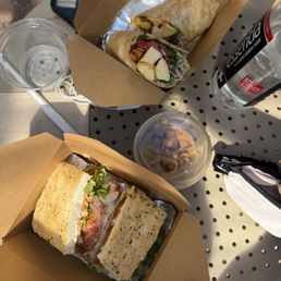 Turkey sandwich  Breakfast wrap  Iced chai with almond milk  Iced cortado with almond milk and salted maple syrup