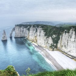 Les Falaises d'Étretat - Eritrat( in the Normandy region), France is just a 135 miles northwest of Paris and 40 miles from Brighton, UK.