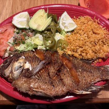 Los Arcos Mexican Restaurant - Mojarra Frita Deep-fried tilapia served with rice, lettuce, tomatoes, and sliced avocado - Mexican Near Me - Goose Creek, South Carolina
