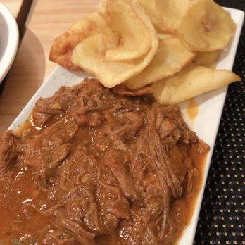 El Sur - Ropa Vieja (shredded flank steak served with plantain chips - Tapas Bars Near Me - Madrid, M